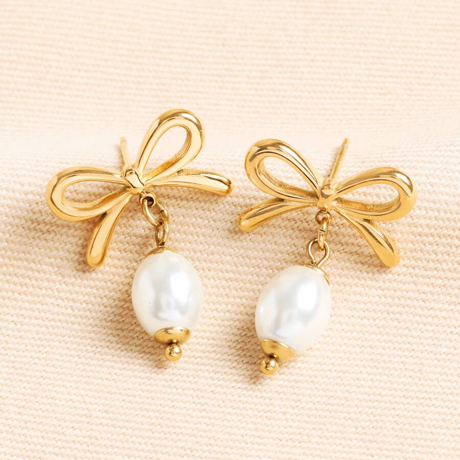 Stainless Steel Bow Pearl Drop Earrings in Gold